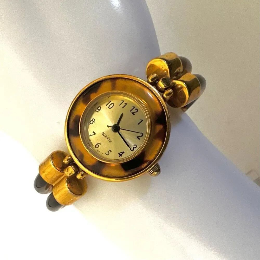 Avon faux tortoise vintage watch/ bracelet.
